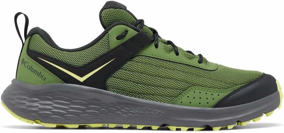 A black Columbia trail running shoe with a dark grey speckled midsole and a rugged black outsole, featuring subtle grey and lime green accents.