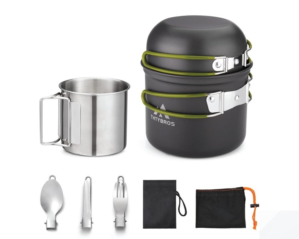 A "THTYBROS" portable cookware set for camping adventures, featuring stacked gray pots with green straps, a stainless steel mug with a folding handle, a folding spoon, a folding knife, a folding fork, a black drawstring bag, and a black mesh bag with an orange drawstring.