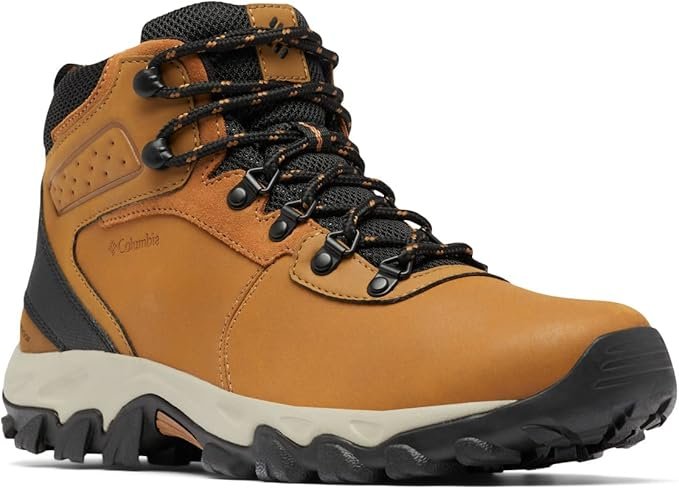 A brown and black Columbia Newton Ridge Plus II hiking boot, a durable mid-ankle waterproof leather boot designed for men and women, with textured sole.