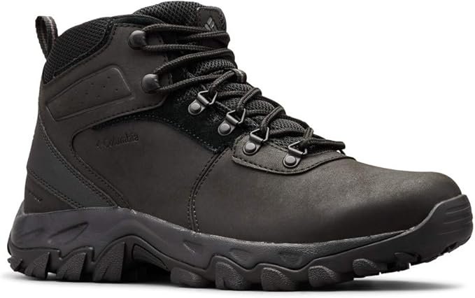 A black Columbia Newton Ridge Plus II hiking boot, a durable mid-ankle waterproof leather boot designed for men and women, with textured sole.