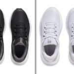 Top-down view of two pairs of Golf Shoes, one black and one white, showcasing their design.